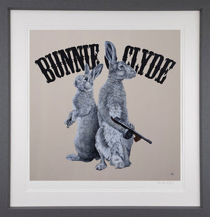 Bunnie And Clyde Framed Print on Paper by Artist Dean Martin (The Mad Artist)